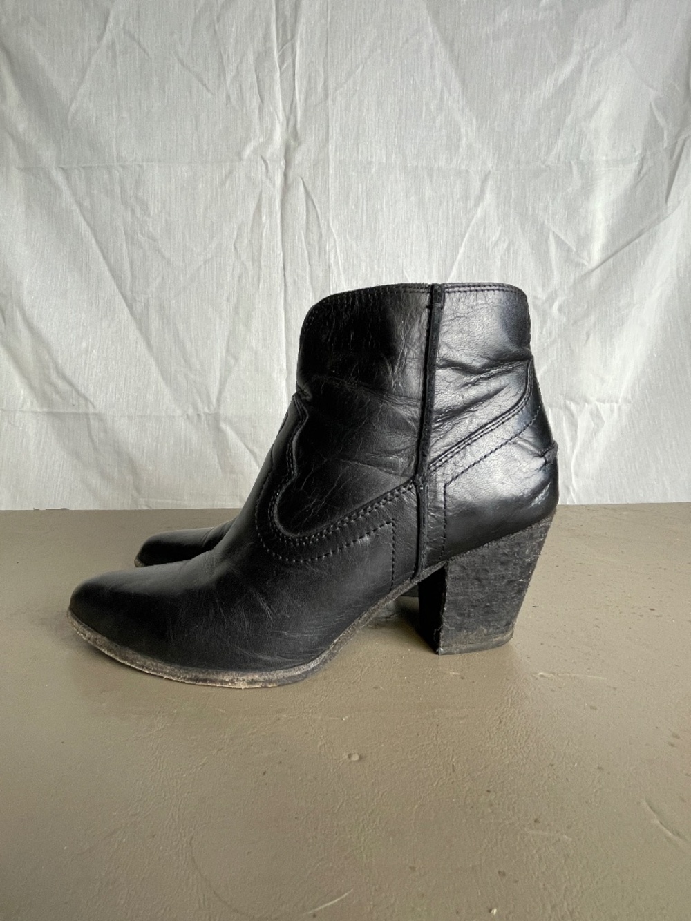 Black leather Frye cowboy ankle boots (7 medium)